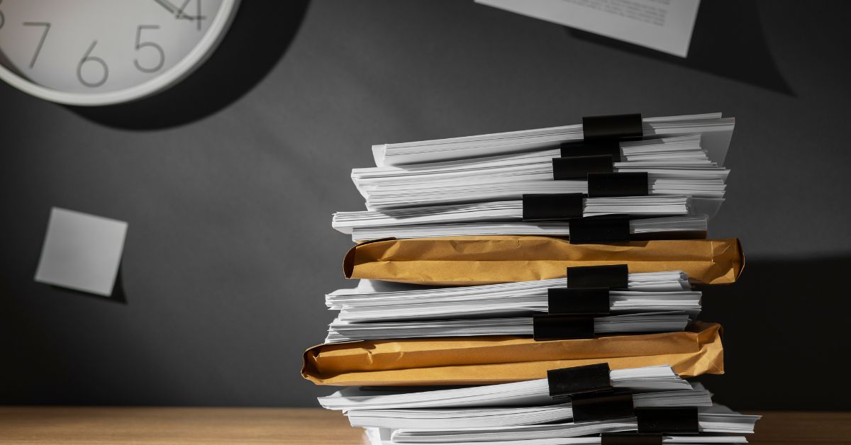 Stack of invoices and receipts for SME bookkeeping in Singapore